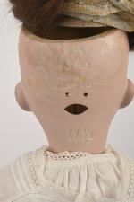 Belle poupée allemande tête porcelaine
marquée en creux "1348 Jutta 11...