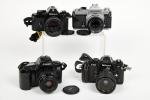 Nikon 
Trois appareils : Nikon EM Obj. Serie E 1.8/50...