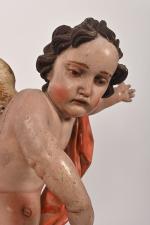 Angelot 
en bois sculpté et polychrome. 
Italie XVIIIe. 
H. :...
