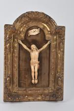 Crucifix
Christ en os dans un cadre en bois sculpté et...