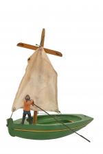 Quiralu, pêcheur breton
avec tige pour son filet. Et un bateau...