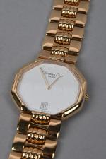 Christian Dior, 
montre bracelet gourmette de dame en métal doré,...