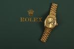 Rolex Oyster Perpetual Date.
Montre de poignet de dame en or...