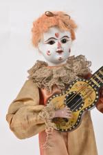 Clown à la guitare
Jolie tête en biscuit blanc maquillé, mouvement...