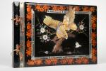 Album photos moderne, 
décor asiatique en relief représentant un aigle,...
