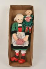 Bécassine, deux poupées en tissu traits peints 
dont une en...