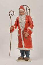 Petitcollin, Père Noël avec sa hotte et sa crosse,
sujet en...