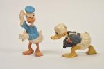 Donald Duck, deux sujets en celluloïd, 
l'un avec tête mobile....