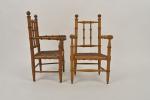 Deux fauteuils cannés façon bambou.
H. 36 cm.