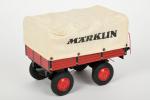 Märklin contemporain, remorque bâchée "Märklin"
à quatre roues. 21 cm.