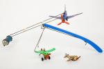 Aviation, trois jouets en tôle lithographiée, état d'usage :
gyroplane électrique...