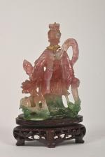 CHINE - XXe siècle
Tabatière en quartz figurant Guanyin. (petites usures...