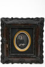 Daguerréotype quart de plaque
à vue ovale, portrait de femme assise...