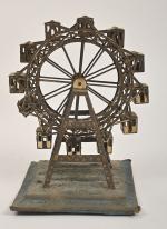 France vers 1900, grande roue type Penny Toy 
en fer...
