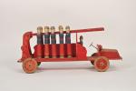 Camion de pompiers :
jouet à traîner en bois peint rouge...