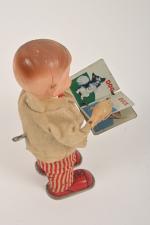 Japon, Baby Book
jouet mécanique en tôle lithographiée, tête celluloïd, (petites...