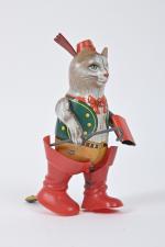 Joustra, le chat botté
Jouet mécanique en tôle sérigraphiée et plastique....
