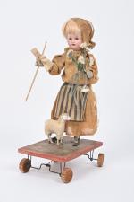 "La bergère"
Jouet à traîner sur quatre roues en bois, personnage...