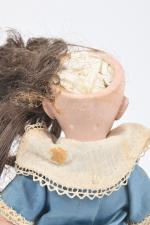 Petite poupée tête porcelaine
Dep Simon & Halbig, moule 749, taille...