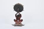 Roulette de comptoir,
piétement en fonte polychrome à rare décor asiatique...