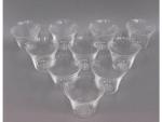R. LALIQUE (1860-1945) Dix gobelets "Pavot" en verre blanc R....
