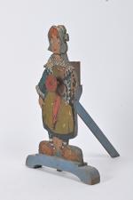 Chamboule-tout, 
figurine en bois découpé lithographié à décor de paysanne....