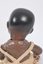 Poupon noir allemand
tête porcelaine peinte à cru, bouche ouverte, yeux...