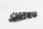 Lionel contemporain, locomotive électrique
trois rails, type 140, noire et grise,...