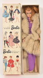 Mattel, Barbie, version rousse, 1962 (en l'état) 
avec reste de...