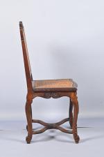 Chaise cannée
en bois mouluré et sculpté, à dossier plat, entretoise...