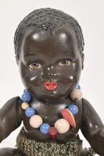 Poupon noir 
Bébé de caractère allemand en céramique, traits peints,...