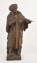 Goldscheider (XIXe siècle)
Le joueur de flute
Plâtre patiné
Sculpture d'édition avec cachet...