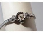 Bracelet montre de dame Rolex en or gris