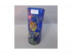 Vase rouleau en verre bleu émaillé à décor floral. Vers...