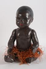 SNF, bébé noir en celluloïd
taille 50, yeux dormeurs avec cils,...