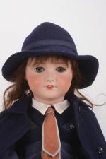 L'écolière, belle poupée
tête porcelaine Unis France moule 301 taille 12,...