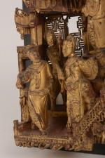Chine, relief en bois sculpté doré
Petite partie d'un élément de...