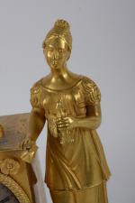 Pendule en bronze doré à décor d'une Allégorie de la...