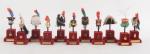 Onze coiffures militaires miniatures
crée par l'Atelier Marcel Riffet d'après les...
