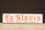 La Slavia
Plaque émaillée imp. Pra Amiens, bandeau horizontal.
37 x 146...