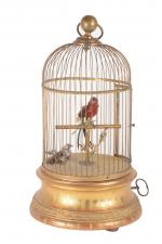 Bontemps, cage à deux oiseaux chanteurs,
socle rond en bois doré....