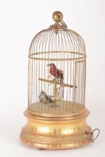 Bontemps, cage à deux oiseaux chanteurs,
socle rond en bois doré....