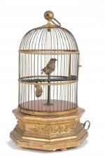 Bontemps, cage à un oiseau chanteur.
Socle octogonal en bois doré....