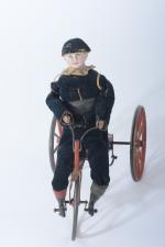 Attribué à Gustave Vichy, personnage sur un tricycle 
en habits...