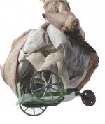 Théroude (attribué à), élégante marcheuse
sur socle à trois roues peint...