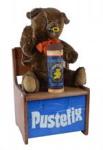 Automate publicitaire électrique
"Pustefix", un ours en peluche assis fait des...