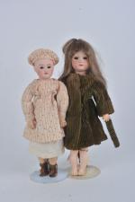 Deux poupées tête porcelaine
l'une Armand Marseille moule 390, yeux marron...