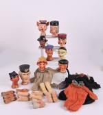 Dix marionnettes à gaine,
têtes en composition, vers 1960. A rattacher.