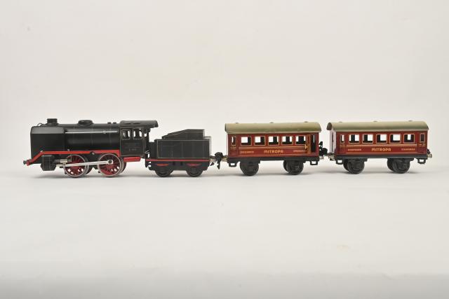 Märklin écart. O, Rame Avec Locomotive Mécanique 020 Rouge Et Noire Ref 58374405