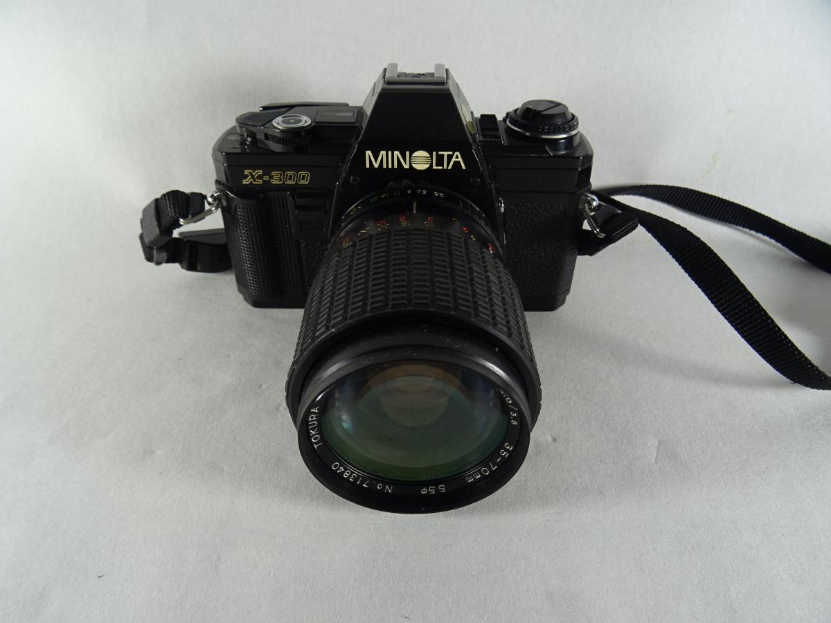 Appareil Photo Argentique Minolta X-300 35 Mm - Boîtier Argenté, Occasion, Testé Et Fonctionnel